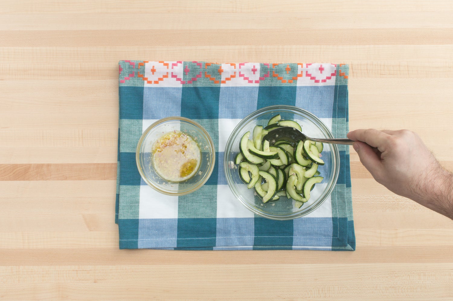 recipe-step-image-Make the vinaigrette & marinate the cucumber:}