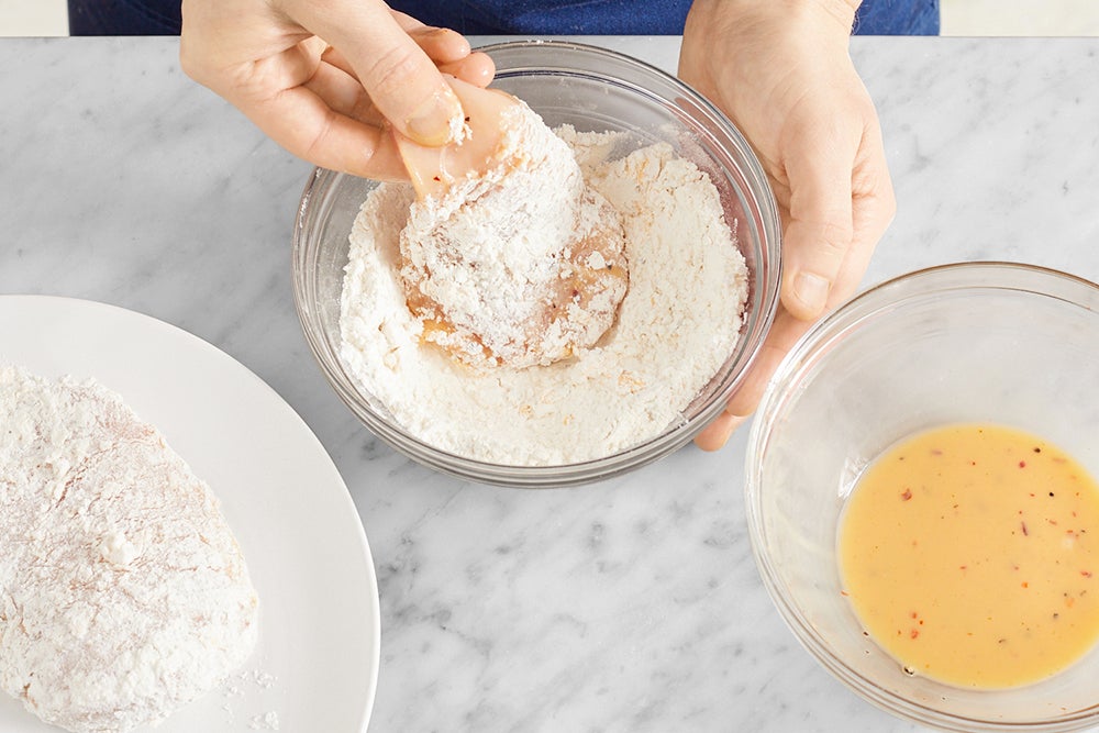 recipe-step-image-Coat the chicken }