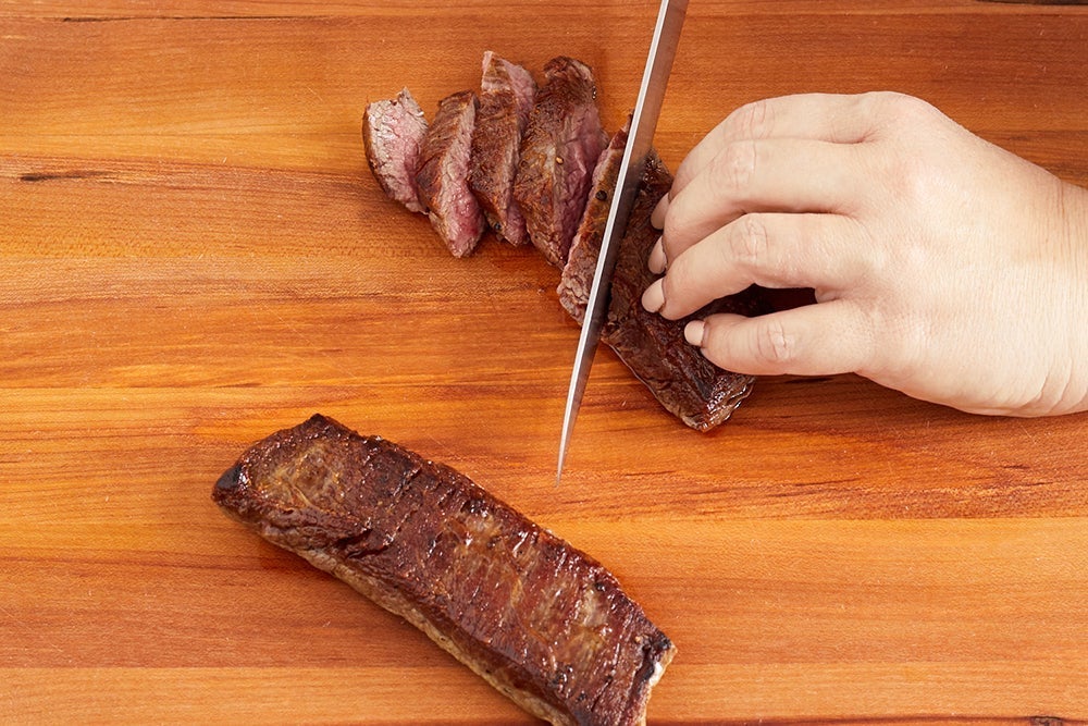 recipe-step-image-Slice the steaks & serve your dish}