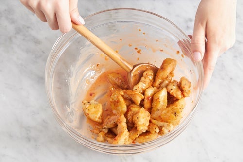 recipe-step-image-Coat, cook & dress the chicken}
