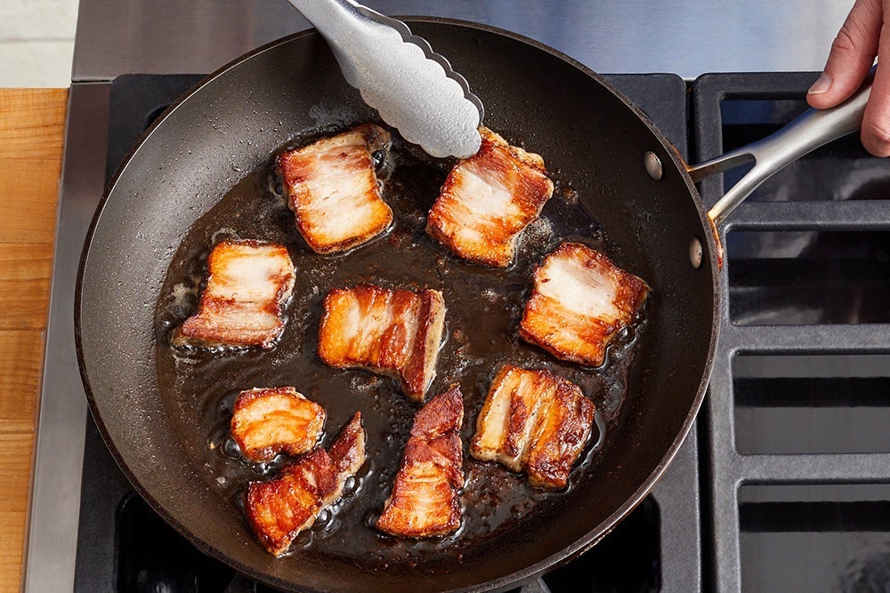 recipe-step-image-Slice & brown the pork belly }