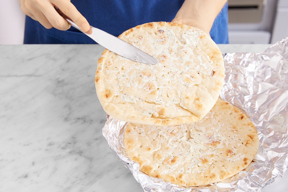recipe-step-image-Make the garlic pitas & serve your dish }