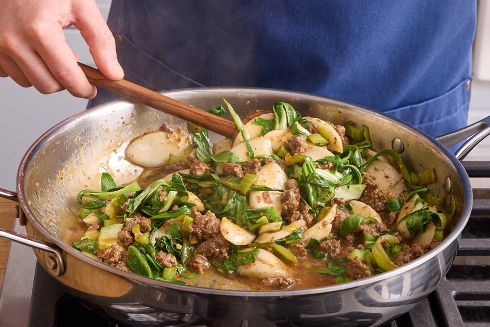 recipe-step-image-Finish the rice cakes & serve your dish}