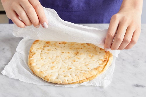 recipe-step-image-Warm the pitas & serve your dish}