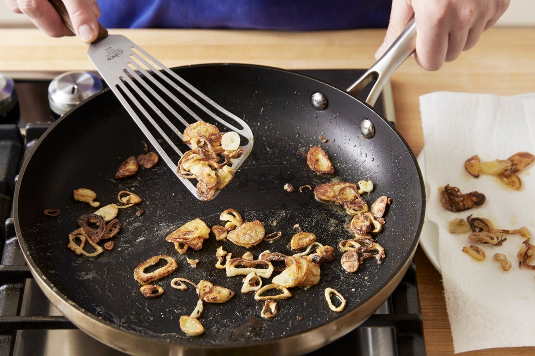 recipe-step-image-Coat & fry the shallot:}