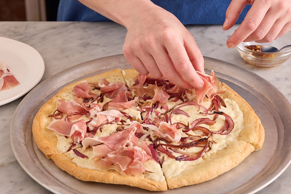 recipe-step-image-Finish the pizza & serve your dish}