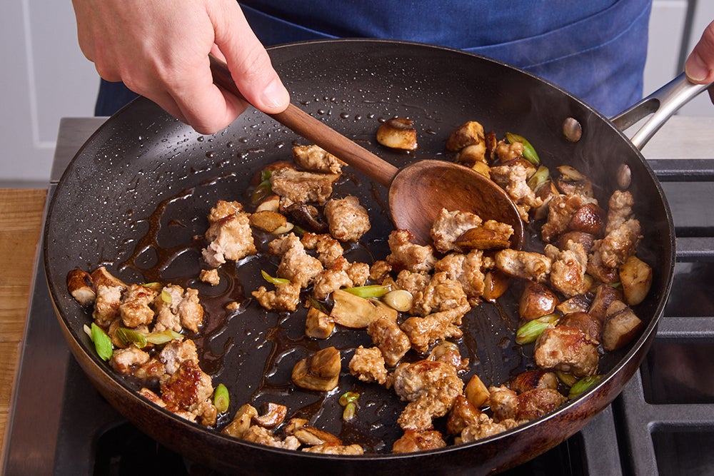 recipe-step-image-Cook the pork & serve your dish}