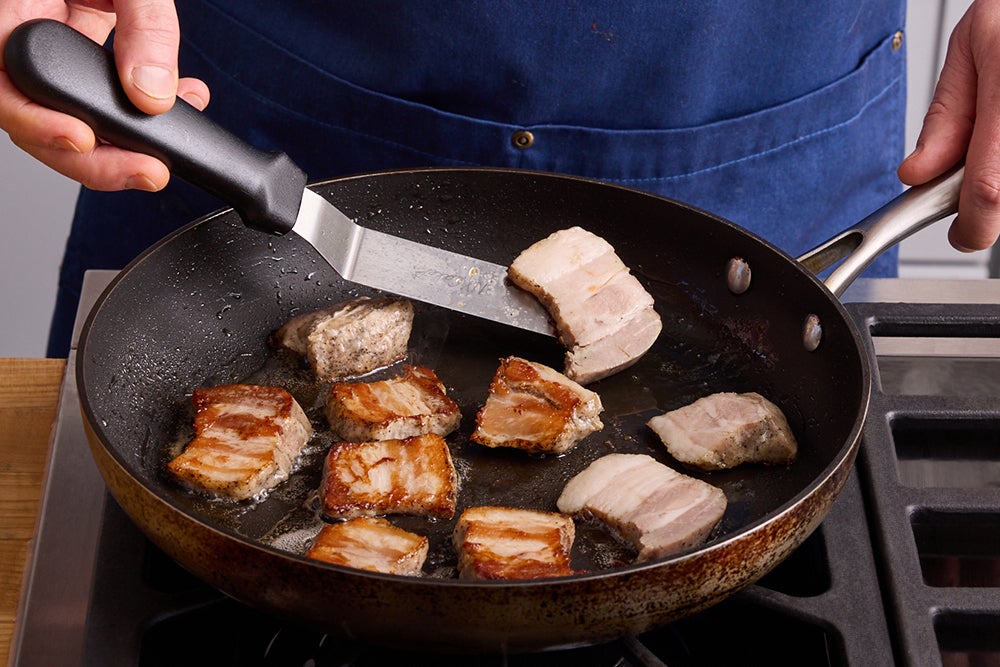 recipe-step-image-Slice & brown the pork belly}